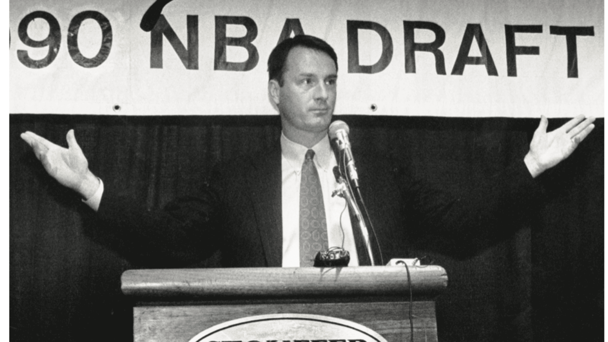 Sonics GM Bob Whitsitt Sonics GM Bob Whitsitt announces future Hall of Famer Gary Payton as the club’s top pick in the 1990 draft.